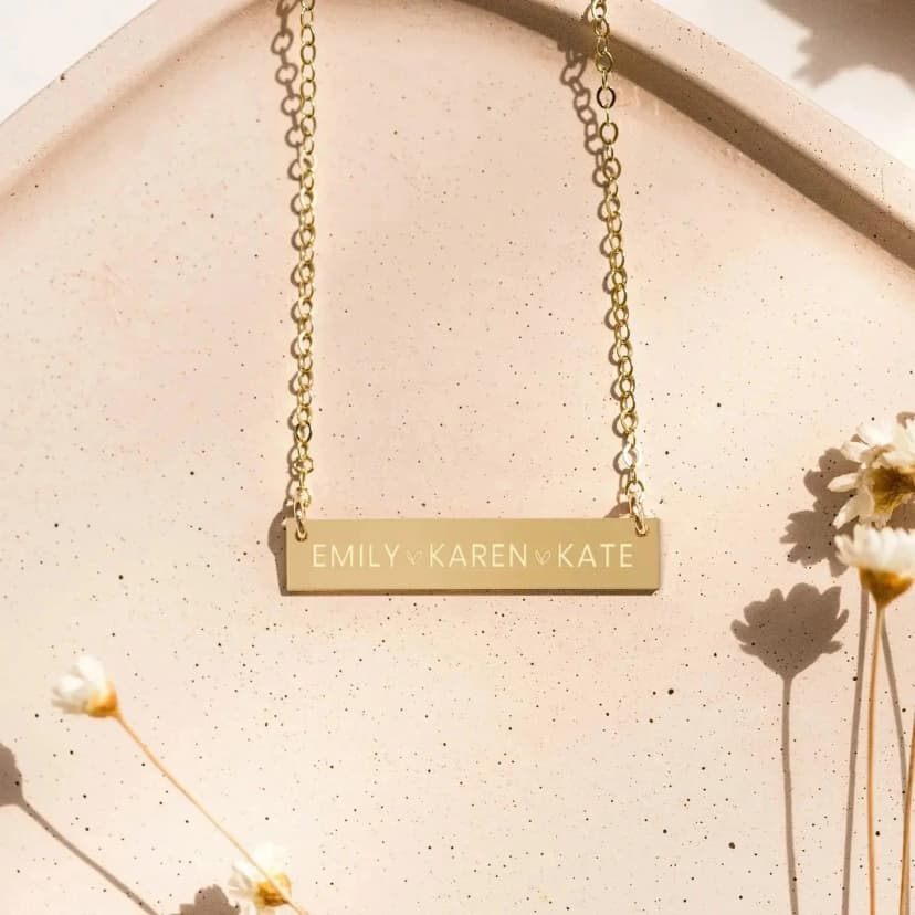 Gold personalized memorial bar necklace with engraved names